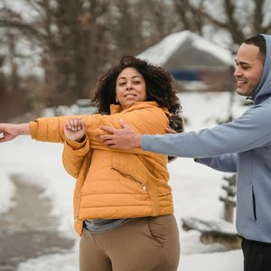 Professional wellness instructor Snizhana Humeniuk smiling.